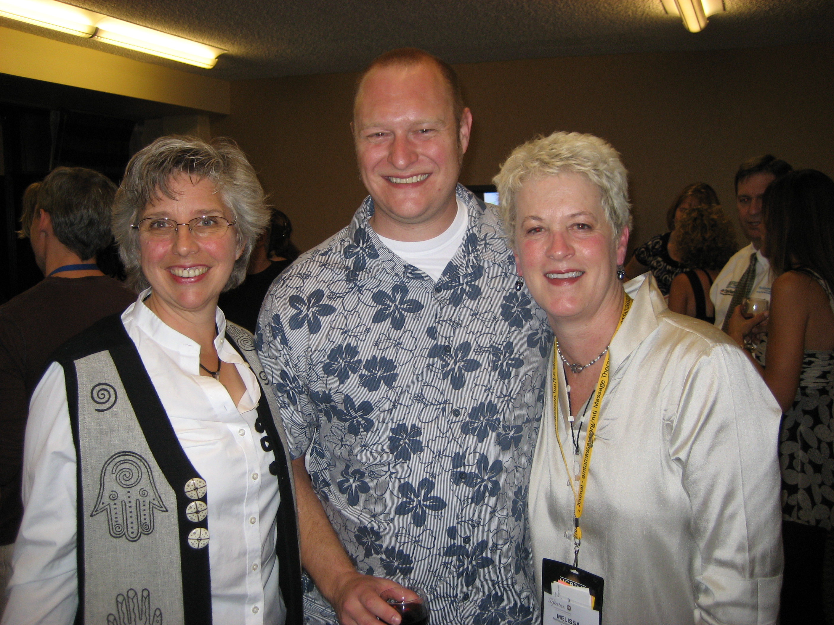 AMTA Convention 015 Author Ruth Werner, NHI Grad John Lambert, & Melissa